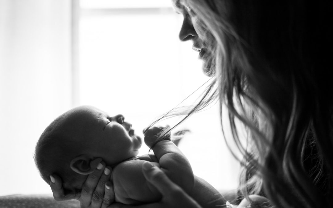 woman holding baby